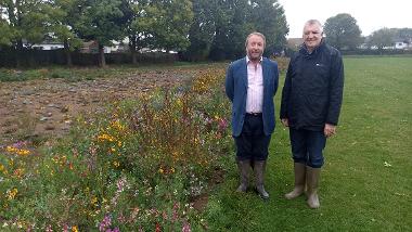 Cllr Jonathan Bianco and Cllr Eddie Lavery outside the newly-created 'swale' in Bessingby Park