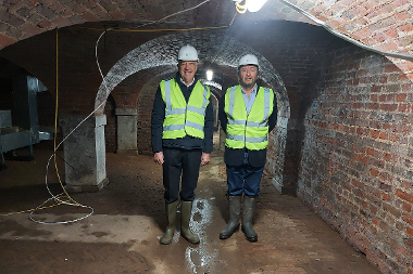 Cllr Eddie Lavery and Cllr Jonathan Bianco in the cellars of Cranford Park