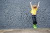 primary school child jumps in the air