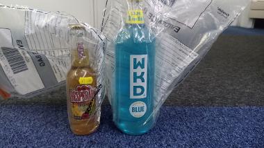 A bottle of blue WKD and a bottle of Desperados bought as part of two test purchases by an under-age customer