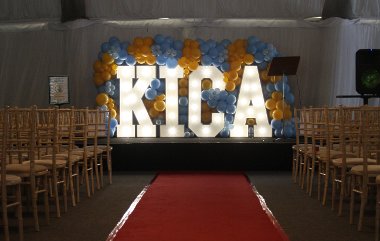 The stage, KICA sign and red carpet