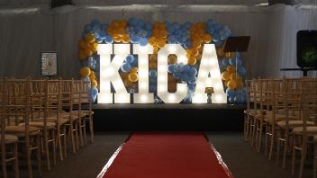 The stage, KICA sign and red carpet