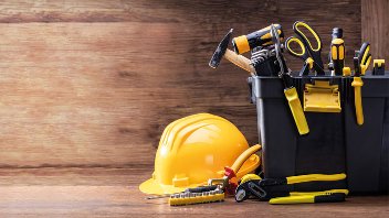 Image of a hard hat and toolbox