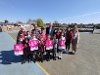 Cllr Eddie Lavery with Neil Wilkey, Headteacher at Newnham Junior School, staff and pupils