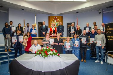 Group shot of all the 2025 Hillingdon Community Awards winners, with the Mayor, Leader and Chief Executive