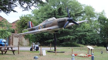Replica Hurricane of Polish 303 Sqn of Flt. Officer Witold Urbanowicz DFC, a treble-ace who flew from RAF Northolt. Below is our Polish 303 Sqn memorial flower bed made by volunteers 