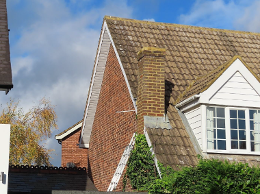 Photo of the house of Ms Naylor and her chimney which she was told could fall down