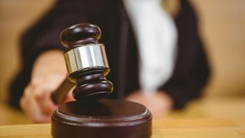 Judge using court hammer 