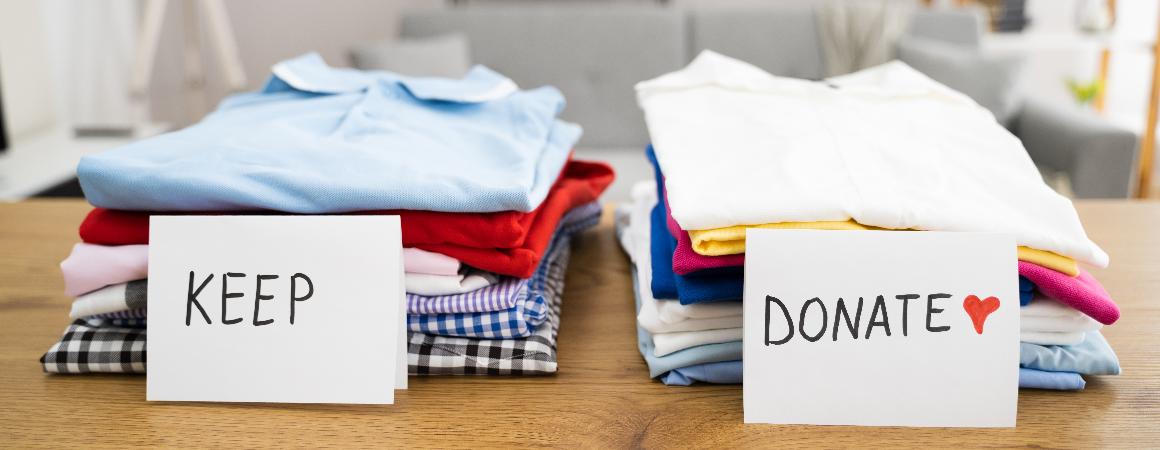 2 piles of clothes - 1 to keep and 1 to donate