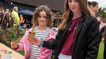 Planting tomato plants at Manor Farm for Heritage Open Days