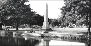 Harefield war memorial reflected in the village pond, (undated). © The Francis Frith Collection
